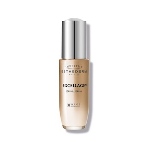 Sérum Excellagent de Institut Esthederm para firmeza y nutrición de la piel. Sérum anti-edad global Institut Esthederm Excellagent Serum, frasco beige con tapa plateada, tratamiento para firmeza, nutrición y luminosidad de la piel.